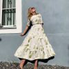 White garden dress with sparkling belt